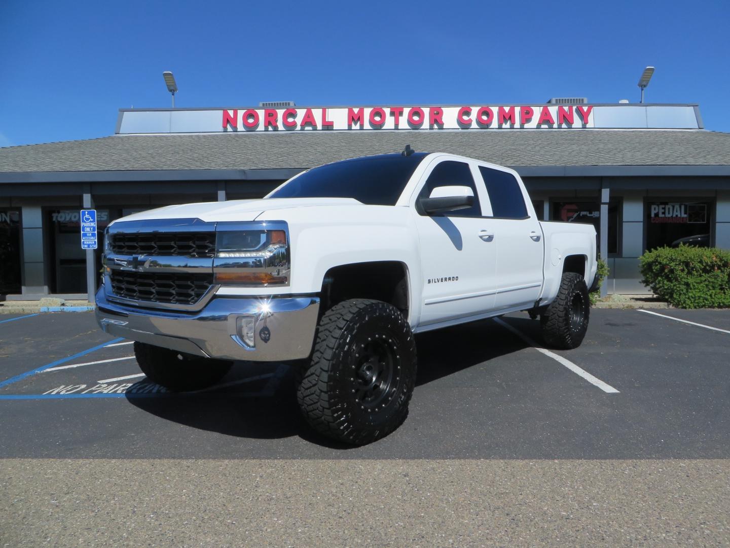 2018 White /BLACK Chevrolet Silverado 1500 LT (3GCPCREC7JG) with an 5.3L V8 OHV 16V engine, automatic transmission, located at 2630 Grass Valley Highway, Auburn, CA, 95603, (530) 508-5100, 38.937893, -121.095482 - Must see Pre Runner.... CST front lift spindals, Camburg UCA's, King Adjustable 2.5 Coil-overs, King 2.5 rear shocks, 35" Toyo RT Trail tires, 17" Method Race wheels, MZ front skid plate, G2 rear differntail cover, Full size bed mounted spare tire, Black Vinyl roof wrap, smoke tail lights and 3rd br - Photo#0